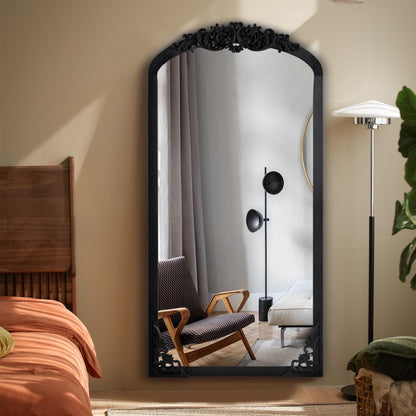 Miroir de sol sculpté en bois massif de forme arquée sur toute la longueur