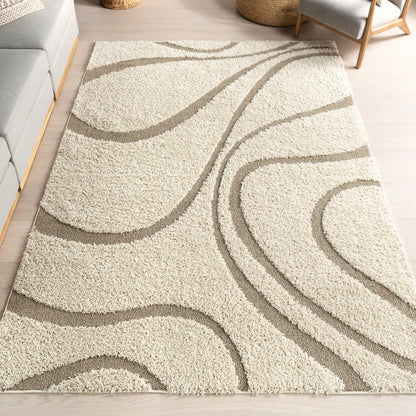Tapis à poils longs Nuloom Krista contemporain à motifs tourbillonnants