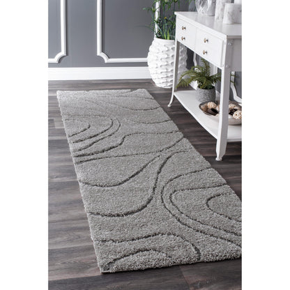 Tapis à poils longs Nuloom Krista contemporain à motifs tourbillonnants