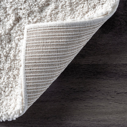 Tapis à poils longs Nuloom Krista contemporain à motifs tourbillonnants