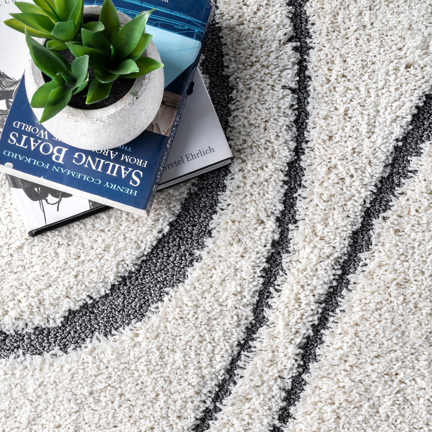 Tapis à poils longs Nuloom Krista contemporain à motifs tourbillonnants