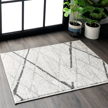 Tapis de sol moderne abstrait Nuloom Skylar