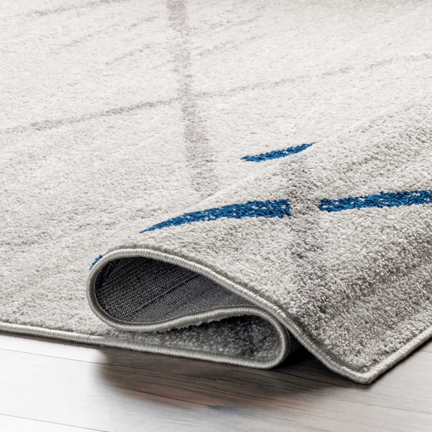 Tapis de sol moderne abstrait Nuloom Skylar