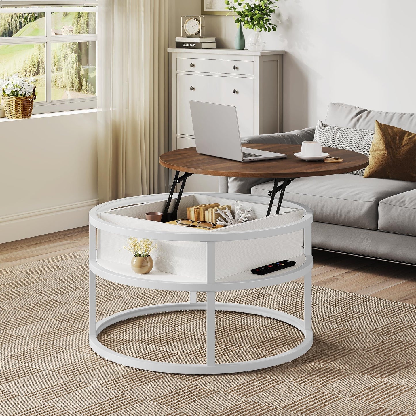 Table basse ronde Moasis avec plateau relevable et rangement dissimulé