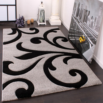 Tapis moderne à motif floral et découpe contour