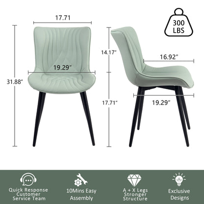 Ensemble de 2 chaises de salle à manger modernes sans accoudoirs, revêtues de cuir.