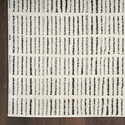 Tapis d'intérieur moderne et confortable Nourison à motifs abstraits