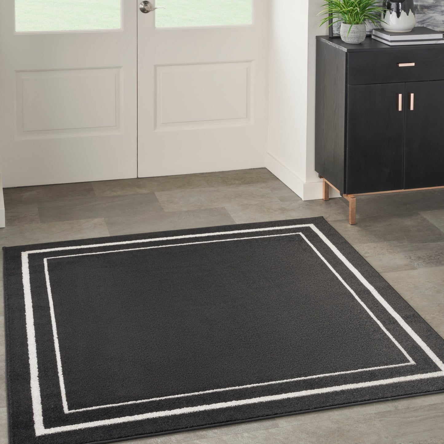 Tapis d'intérieur/extérieur uni Nourison Essentials