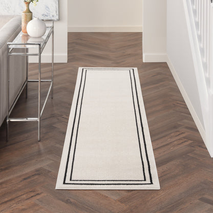 Tapis d'intérieur/extérieur uni Nourison Essentials