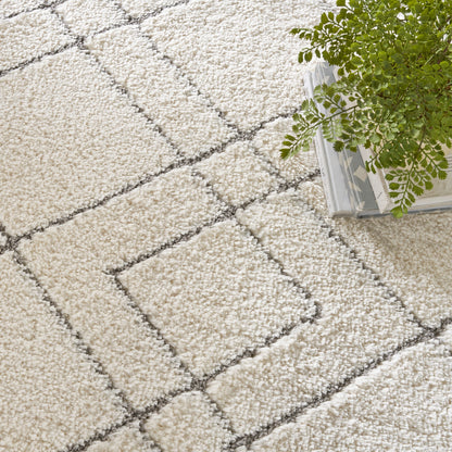 Tapis Nourison Luxueux à poils longs ultra moelleux, motif géométrique abstrait