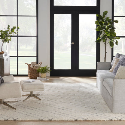 Tapis Nourison Luxueux à poils longs ultra moelleux, motif géométrique abstrait