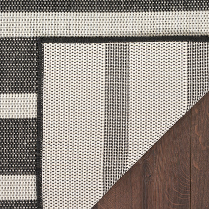 Tapis rayé d'intérieur/extérieur Nourison Selerno.