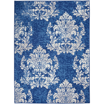 Tapis Nourison Whimsicle style campagne française, motif botanique, ivoire et marine