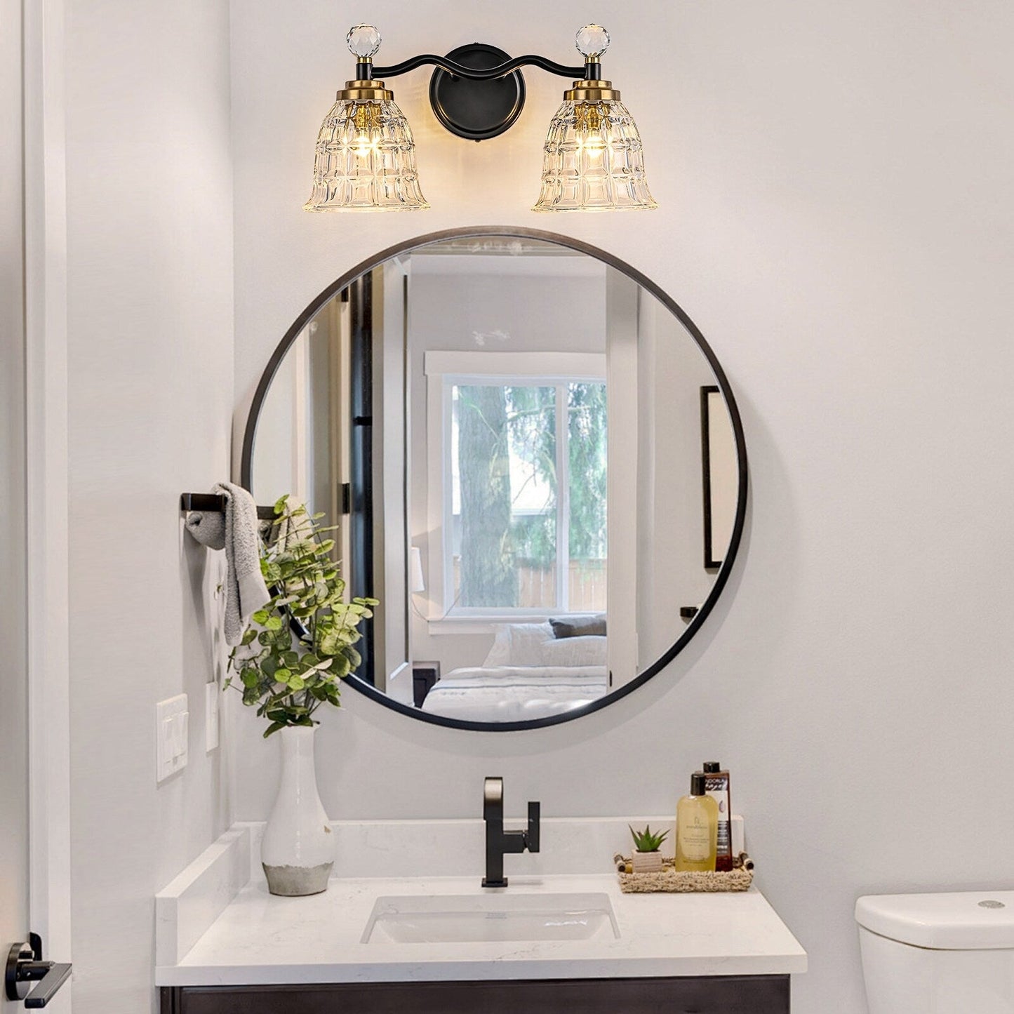 Luminaires de salle de bain modernes Ora à intensité variable, noirs et dorés