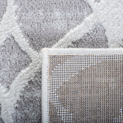 Tapis SAFAVIEH Amelia Tanasa géométrique à l'aspect vieilli