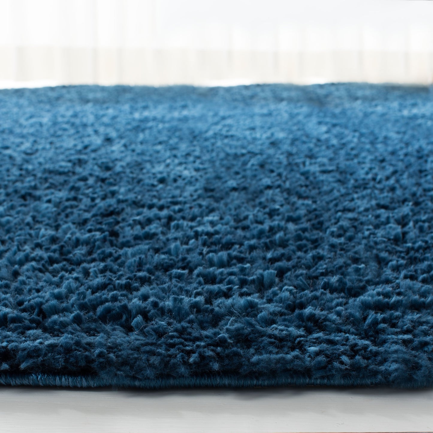 Tapis SAFAVIEH August Wilhelma Shag uni de 3 cm d'épaisseur
