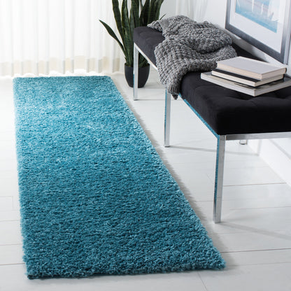 Tapis SAFAVIEH August Wilhelma Shag uni de 3 cm d'épaisseur