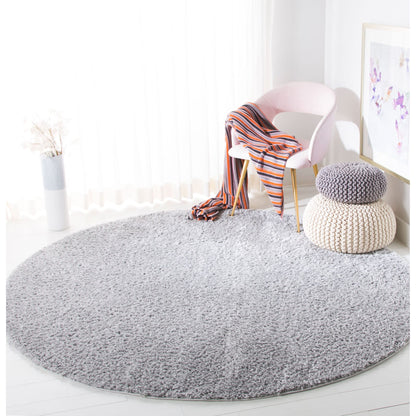 Tapis SAFAVIEH August Wilhelma Shag uni de 3 cm d'épaisseur