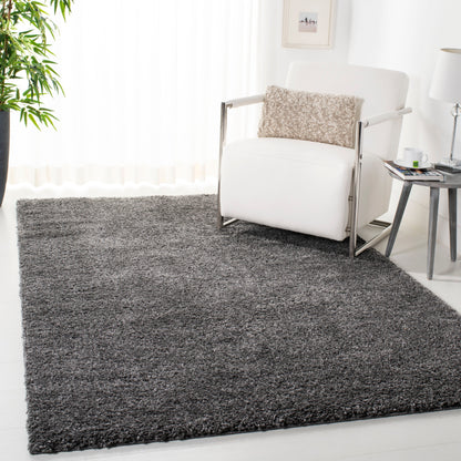 Tapis SAFAVIEH August Wilhelma Shag uni de 3 cm d'épaisseur
