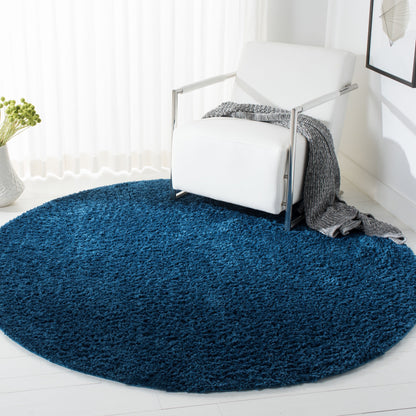 Tapis SAFAVIEH August Wilhelma Shag uni de 3 cm d'épaisseur