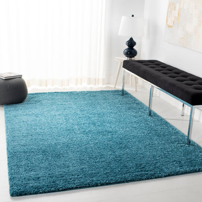 Tapis SAFAVIEH August Wilhelma Shag uni de 3 cm d'épaisseur