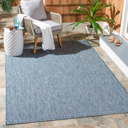 Tapis de patio/jardin imperméable SAFAVIEH Courtyard Begajeta pour intérieur/extérieur.
