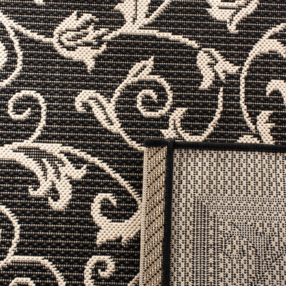 Tapis de jardin/terrasse imperméable SAFAVIEH Courtyard Miljeta