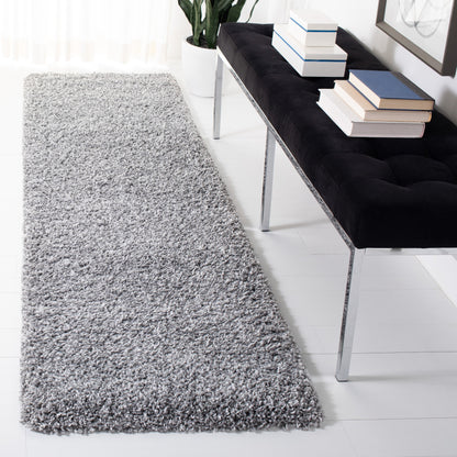 Tapis SAFAVIEH Evolution Shag Fransien uni de 4,6 cm d'épaisseur