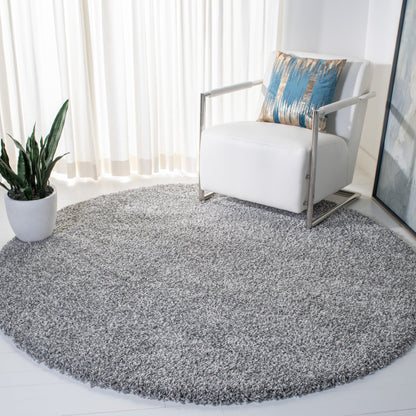 Tapis SAFAVIEH Evolution Shag Fransien uni de 4,6 cm d'épaisseur
