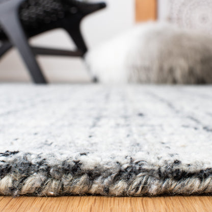 Tapis moderne en viscose SAFAVIEH fait main, motif abstrait corail