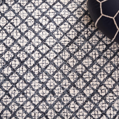 Tapis moderne en laine abstrait fait main SAFAVIEH Suhad