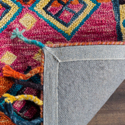 Tapis en laine Aspen Hysnie éclectique orange/fuchsia fait main SAFAVIEH