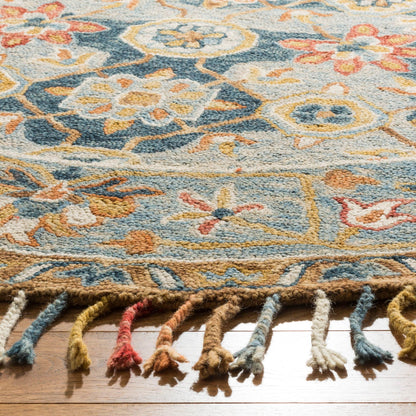 Tapis en laine à pompons bohème SAFAVIEH fait main en tremble Kimm