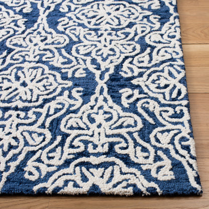 Tapis en laine moderne à motif floral SAFAVIEH fait main Blossom Cateluta