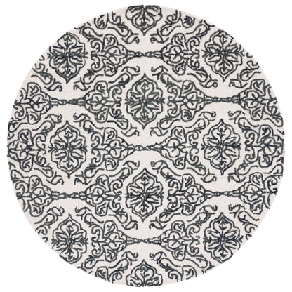 Tapis en laine moderne à motif floral SAFAVIEH fait main Blossom Cateluta
