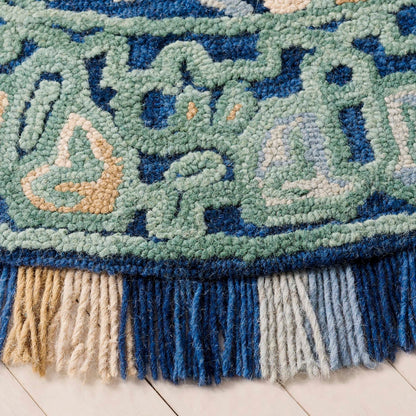 Tapis en laine à motif floral Porzia fait main SAFAVIEH