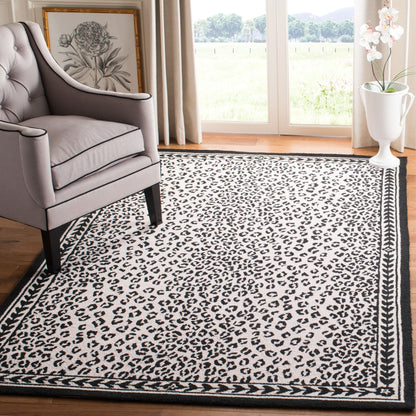 Tapis SAFAVIEH fait main Chelsea Solar Garden Leopard en laine de campagne française