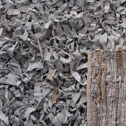 Tapis décoratif moderne SAFAVIEH en cuir shaggy fait main Doinita