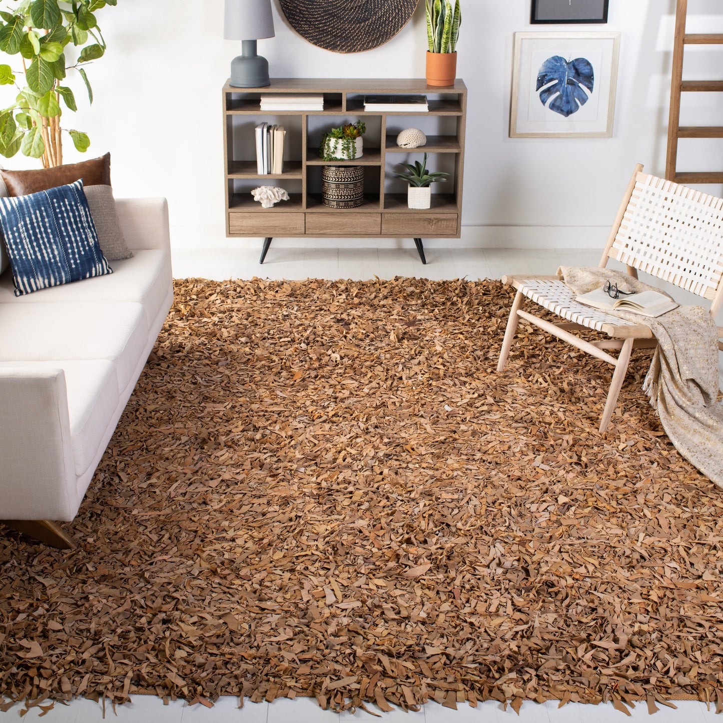 Tapis décoratif moderne SAFAVIEH en cuir shaggy fait main Doinita