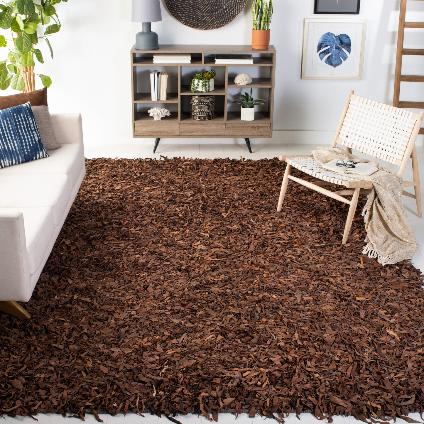 Tapis décoratif moderne SAFAVIEH en cuir shaggy fait main Doinita