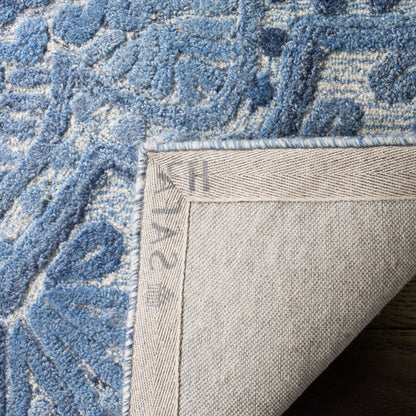 SAFAVIEH Tapis en laine à médaillon moderne Carlijn fait à la main