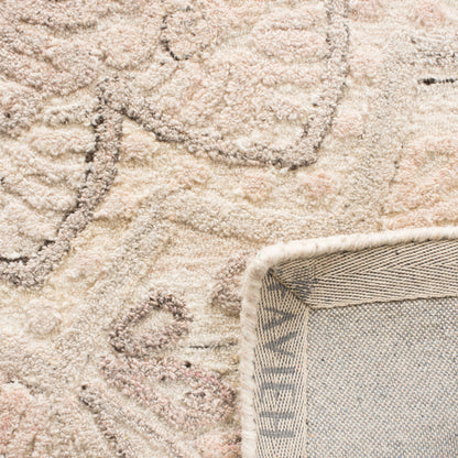 SAFAVIEH Tapis en laine à médaillon moderne Carlijn fait à la main