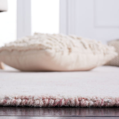 Tapis en laine SAFAVIEH Metro Rozsika fait main, style campagne française