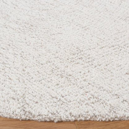 Tapis en laine SAFAVIEH Metro Rozsika fait main, style campagne française