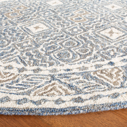 Tapis SAFAVIEH en laine Lutetia micro-bouclée faite à la main