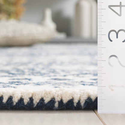 Tapis SAFAVIEH en laine Lutetia micro-bouclée faite à la main
