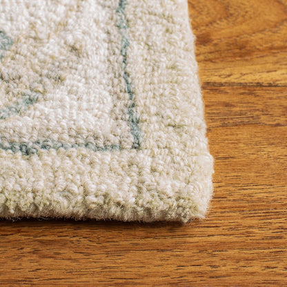 Tapis SAFAVIEH en laine Selveta micro-bouclée faite à la main