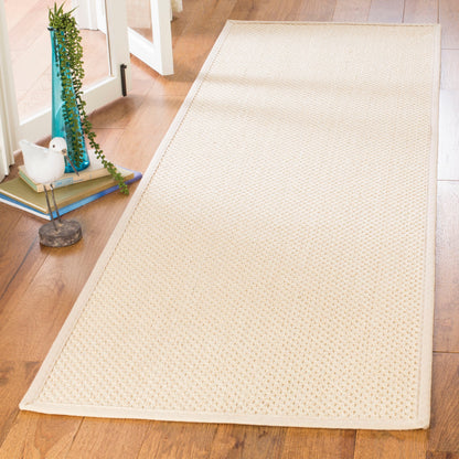 Tapis en fibre naturelle Consuelo en jonc de mer SAFAVIEH