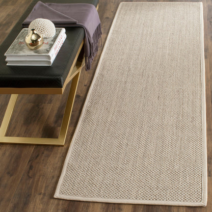 Tapis en sisal Lorine à bordure décontractée en fibres naturelles SAFAVIEH