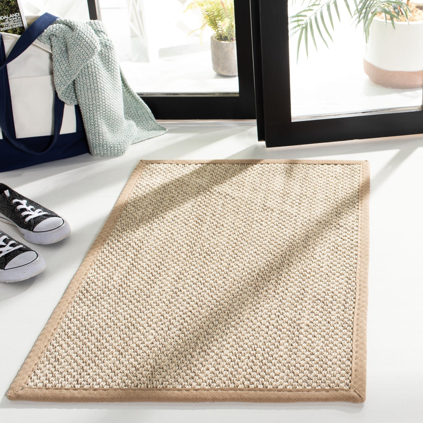 Tapis en sisal Lorine à bordure décontractée en fibres naturelles SAFAVIEH